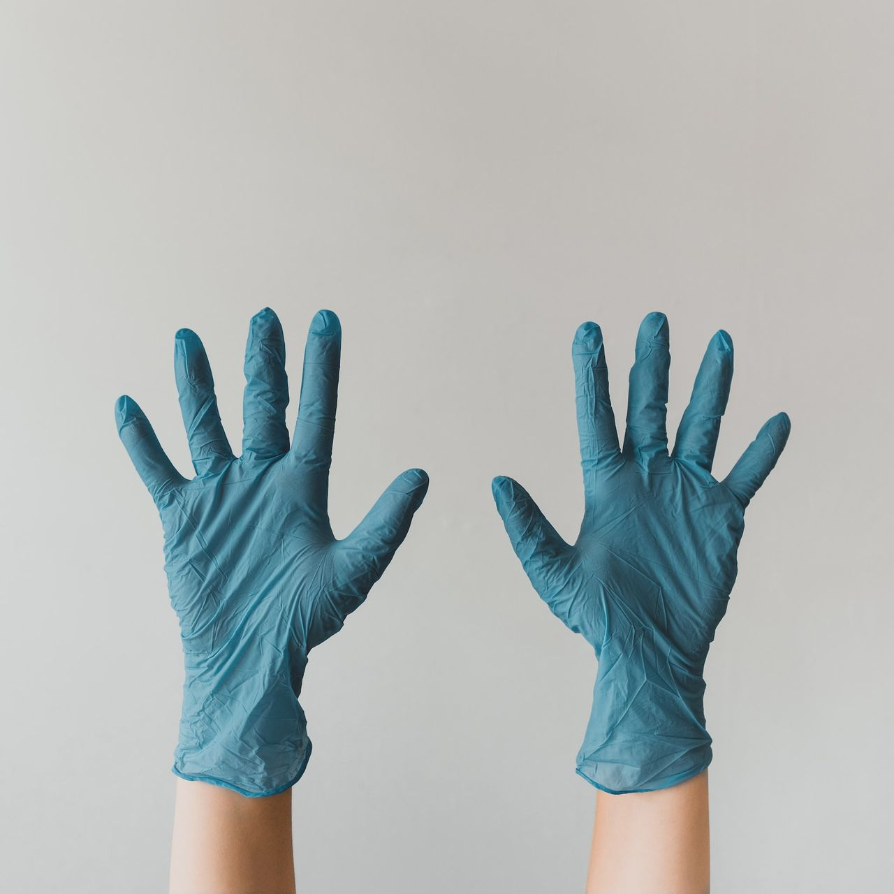 persons left hand with white background